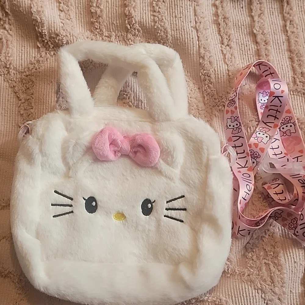 Hello Kitty Handbag with adjustable shoulder strap. White with pink bow. NWOT